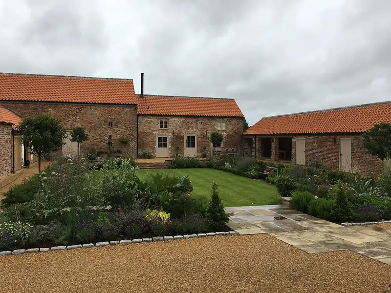 Pantile barns around a courtyard garden