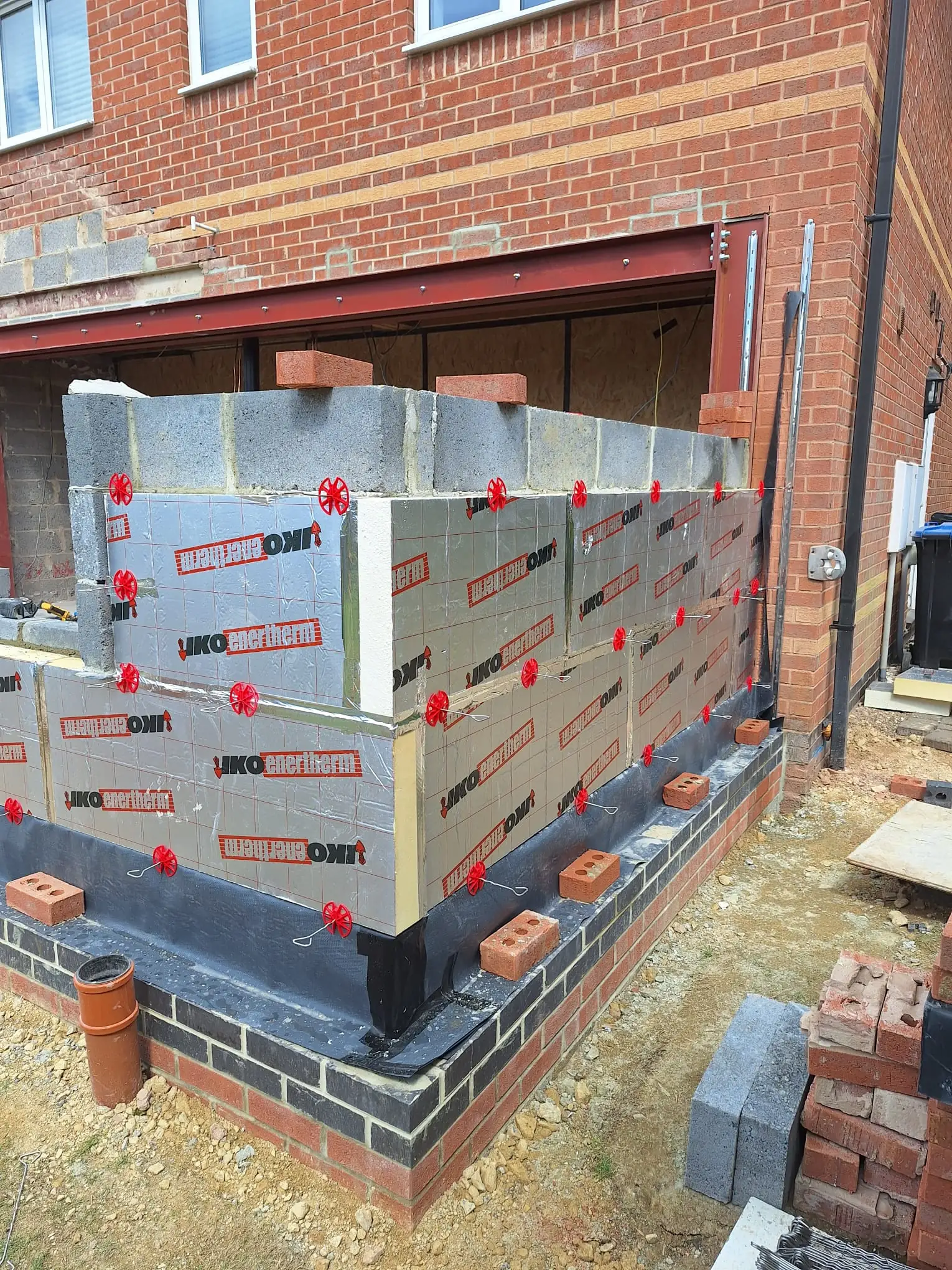 Blockwork and insulation going up