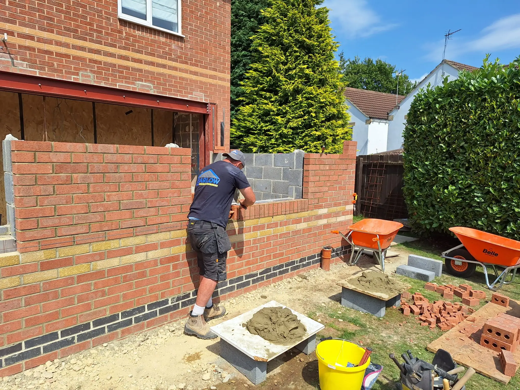 Bricklayer working on the extension
