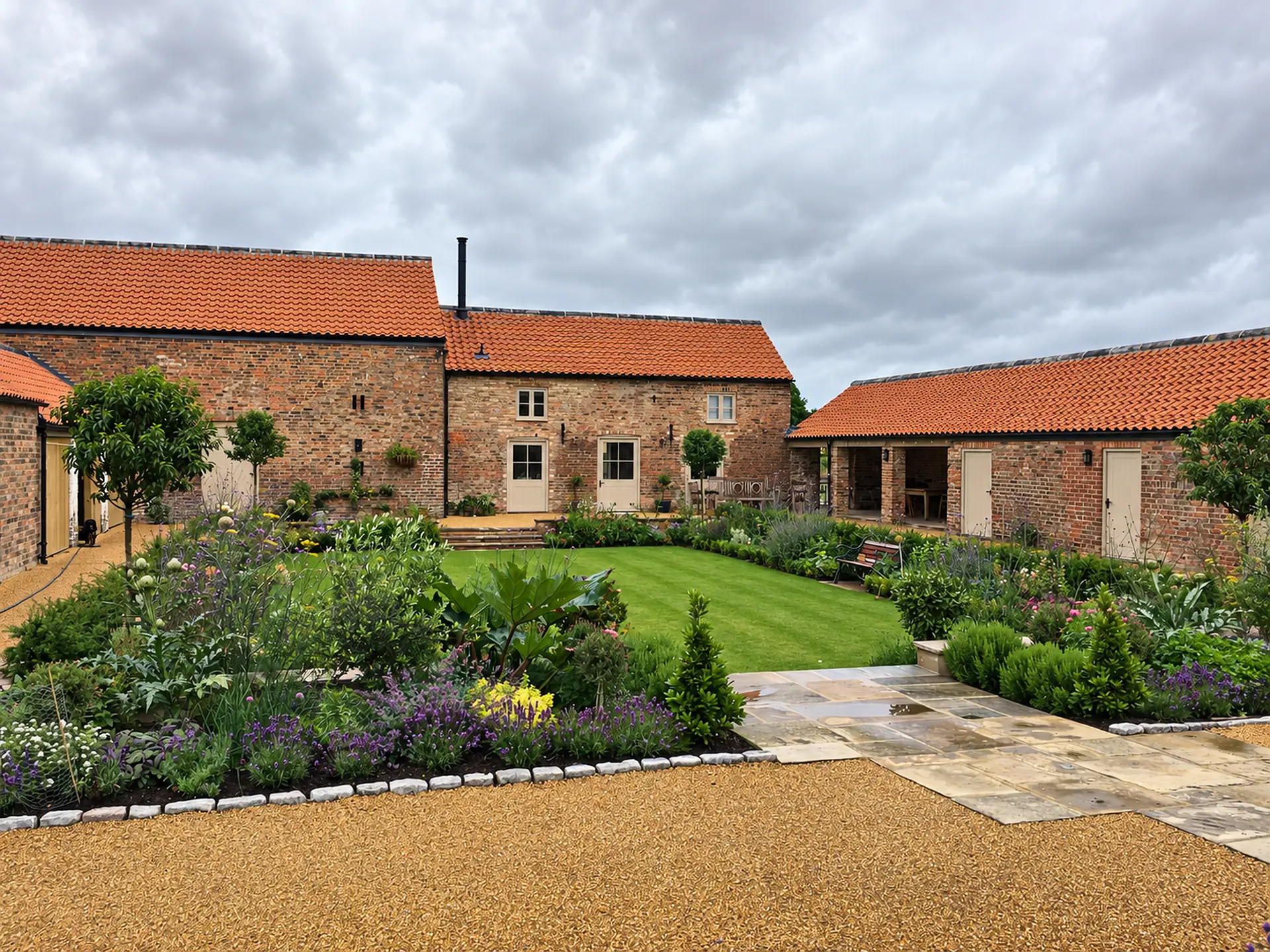 Converted barns around a landscaped courtyard