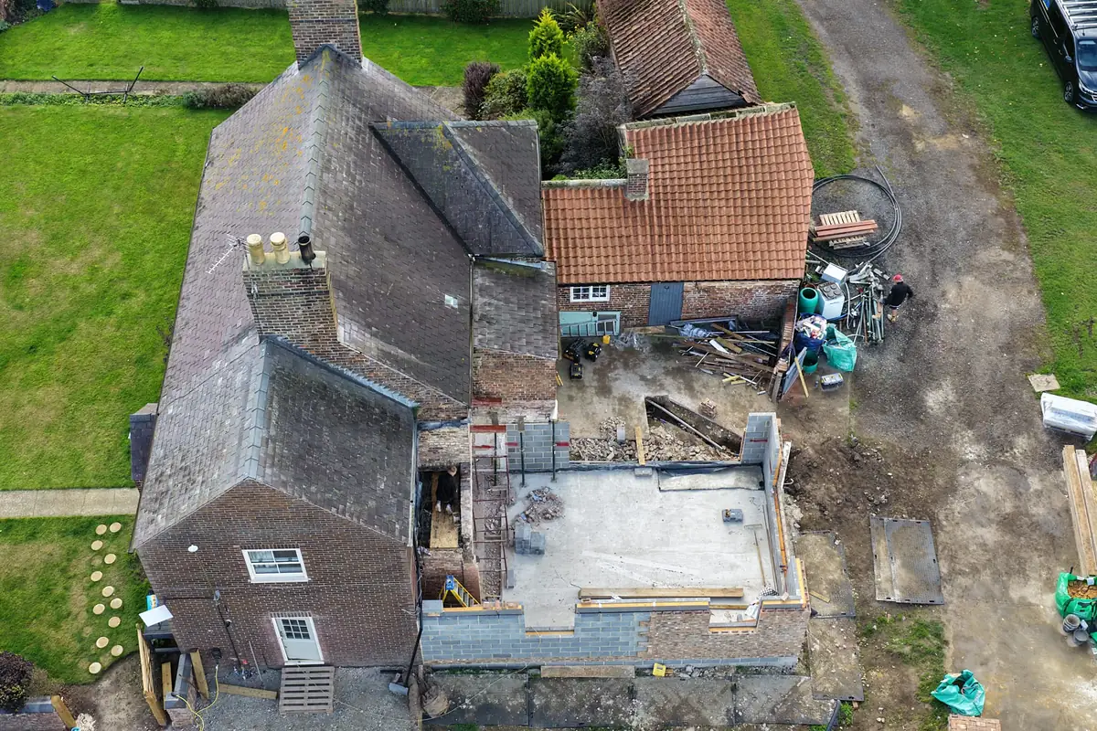 Crakehill Farm from above, with the new extensions rising beside the farmhouse