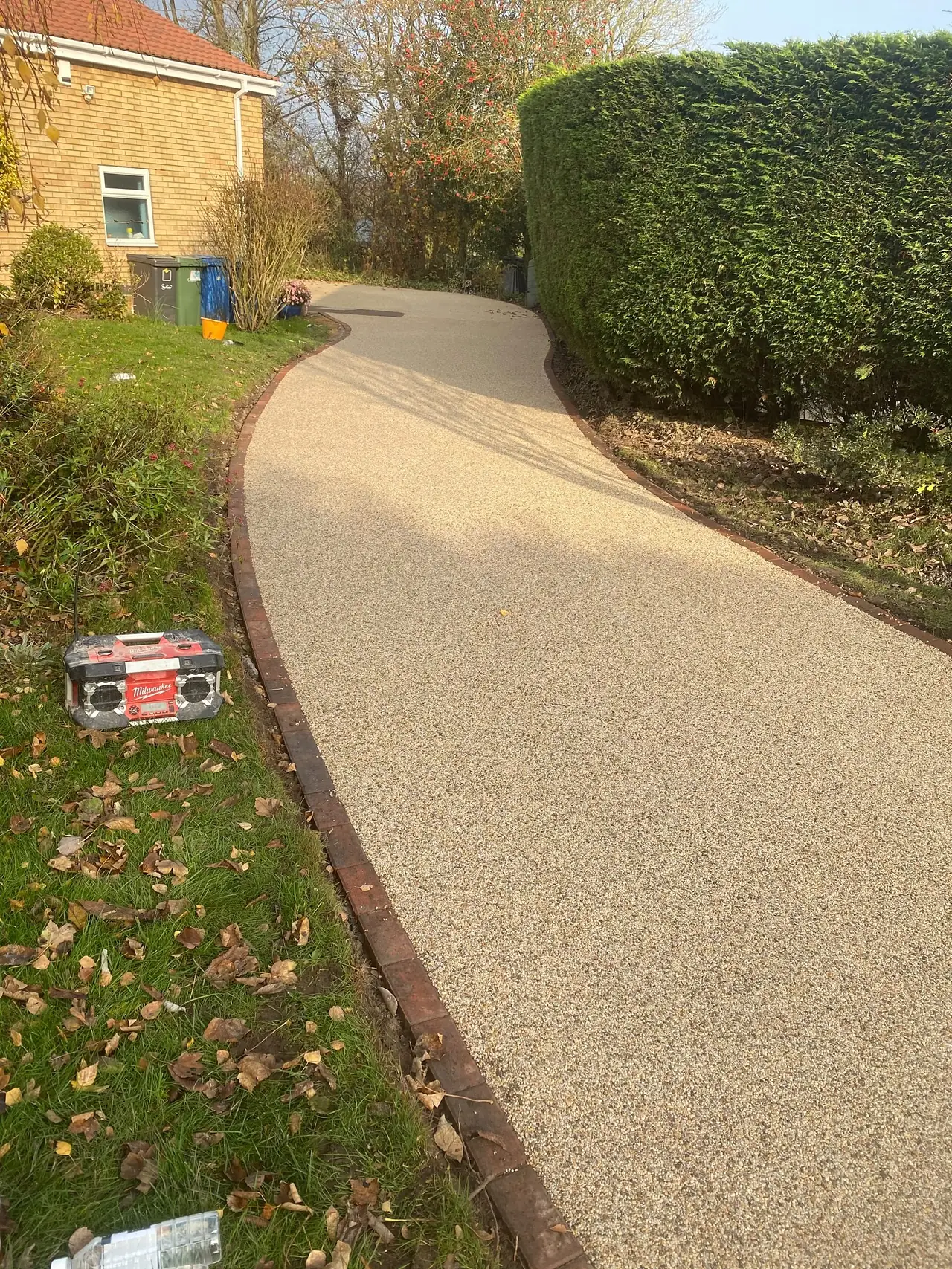 Curving resin path through a garden