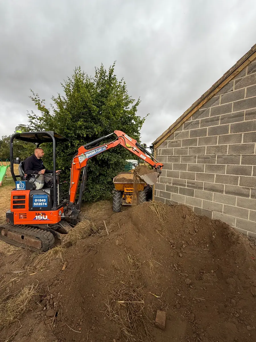 Digging out footings with a mini digger