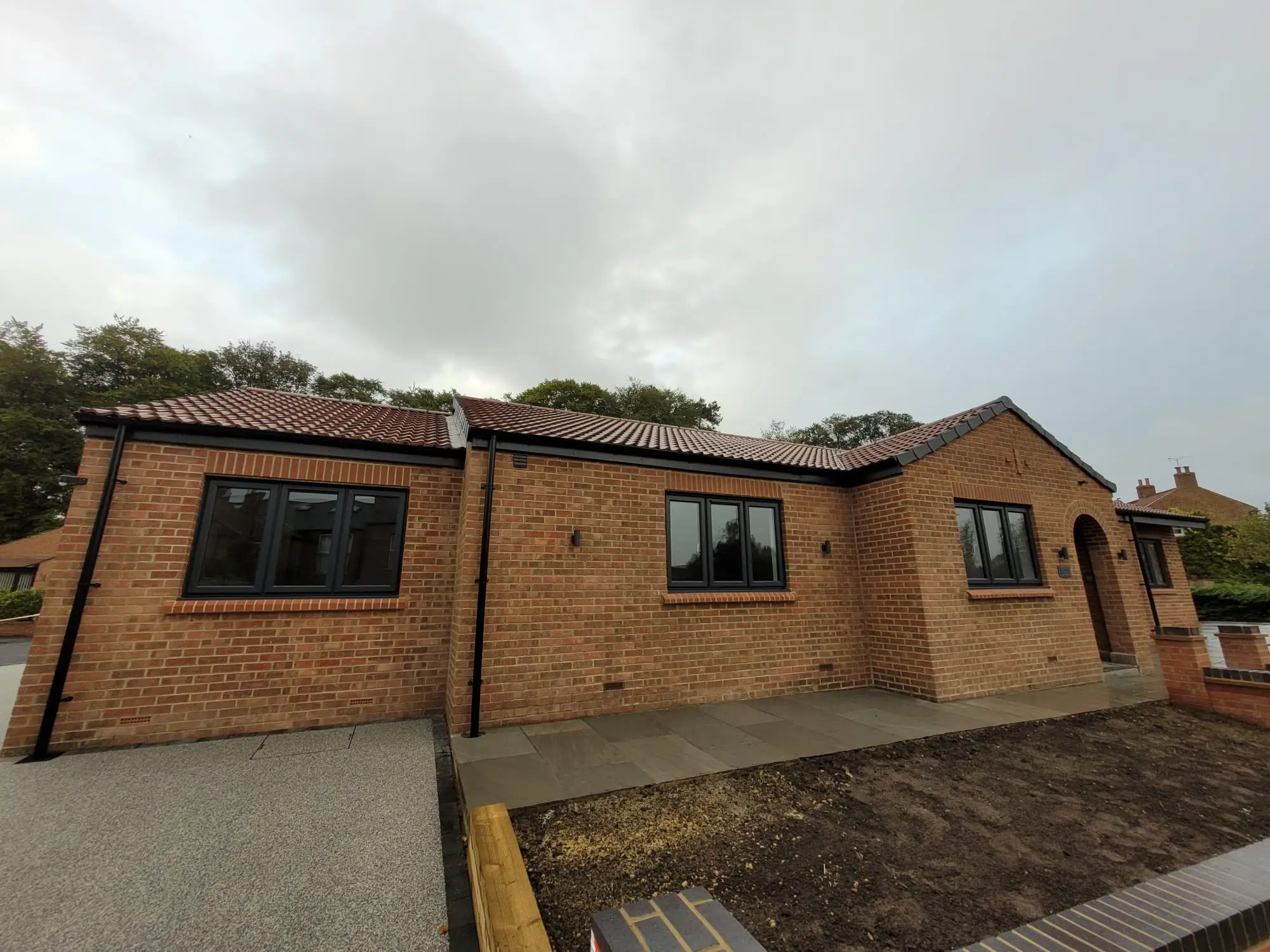 Finished frontage with new brick walls