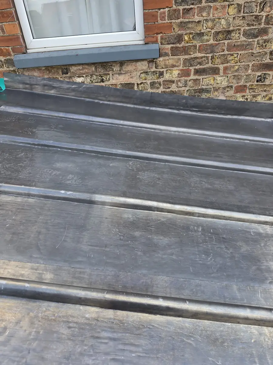 Finished lead roll flat roof