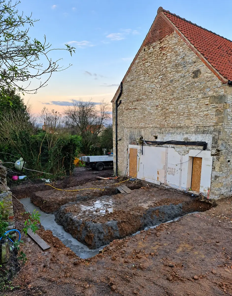 Footings dug and concreted for a stone extension on a farmhouse