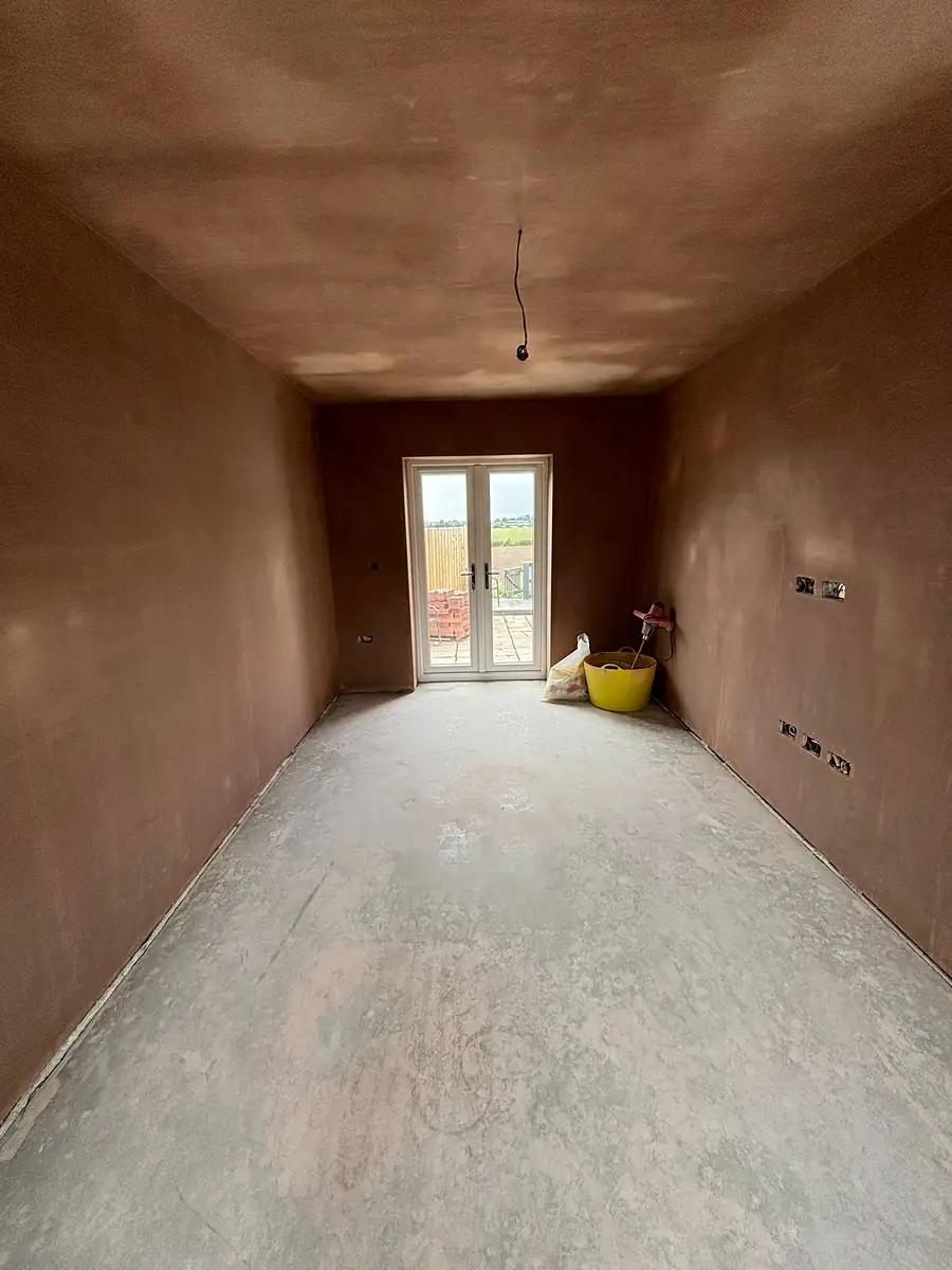 Fresh plaster drying in a new room