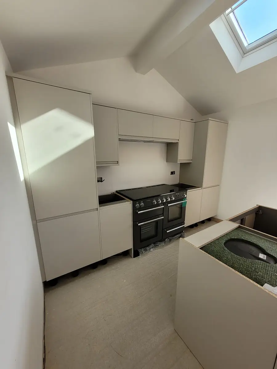 Kitchen with rooflights in a renovated room