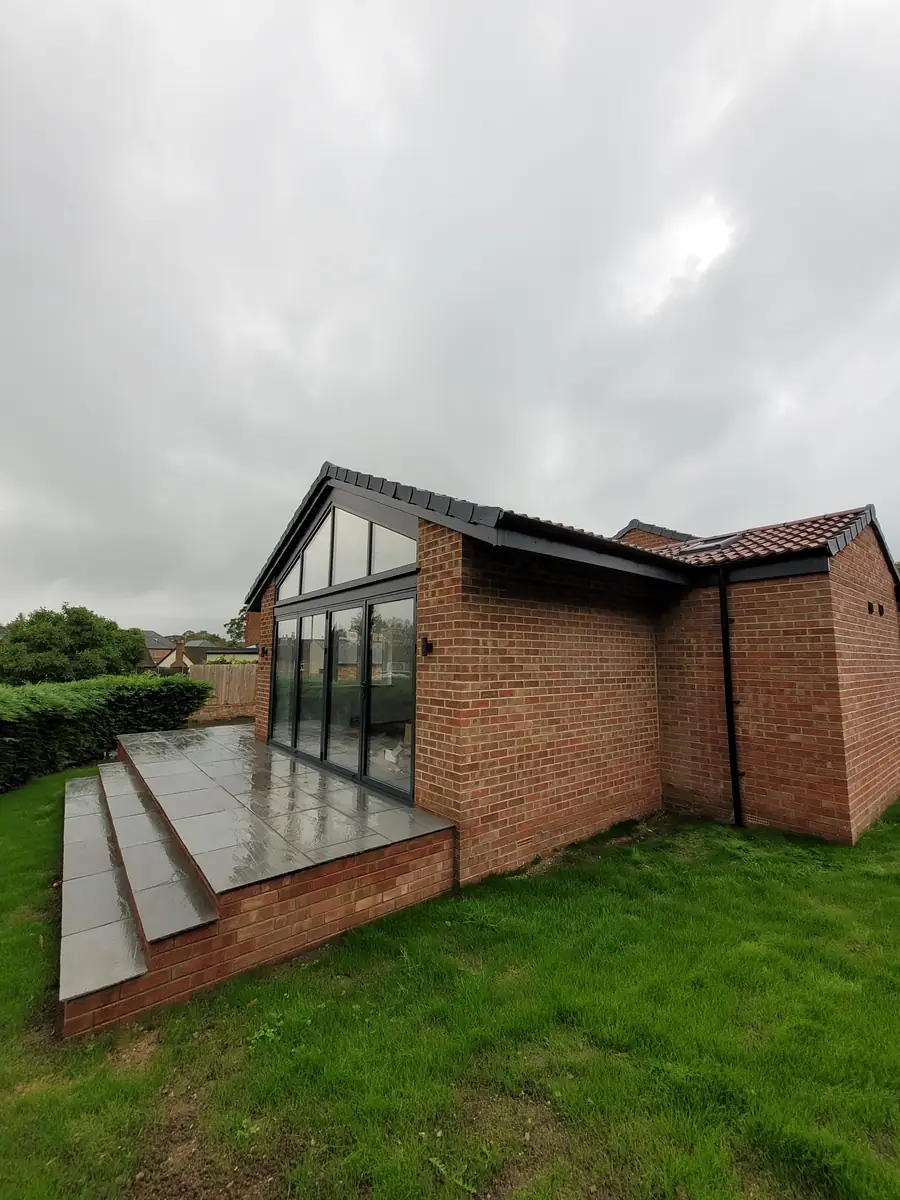 Mallorie Court finished, with the glazed gable onto the garden