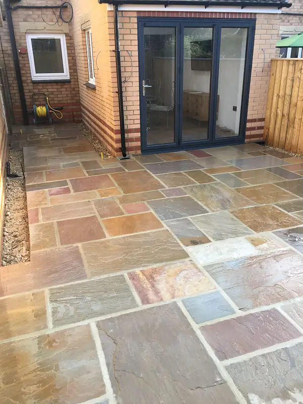 Natural stone patio in mixed colours