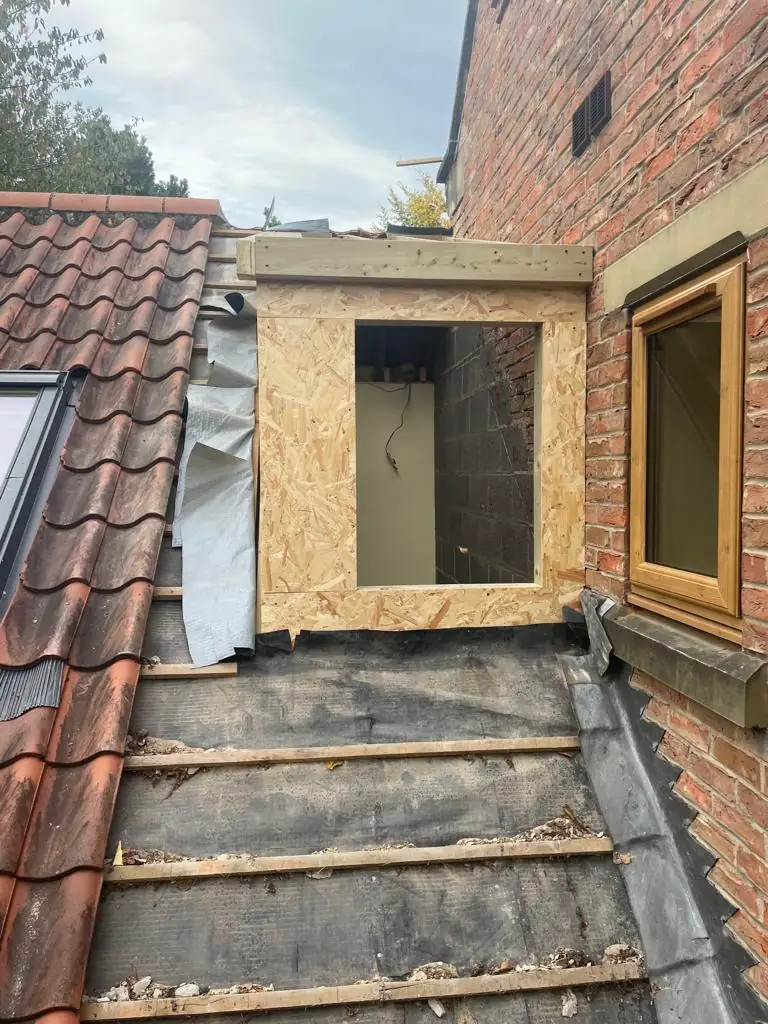 New dormer framed out on the roof