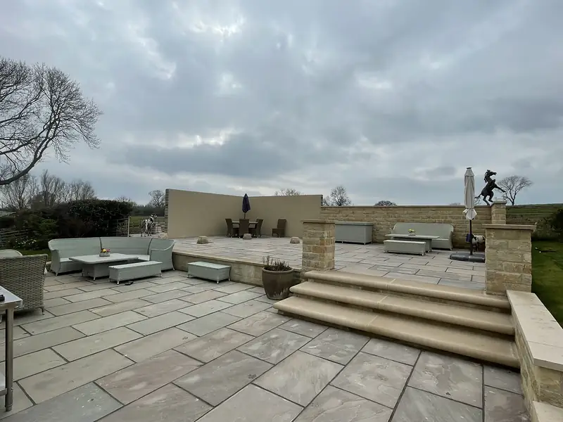 Raised sandstone terrace with steps