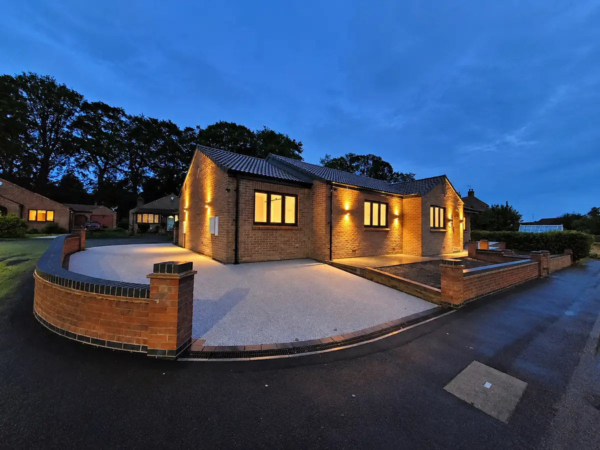 Rebuilt bungalow at dusk