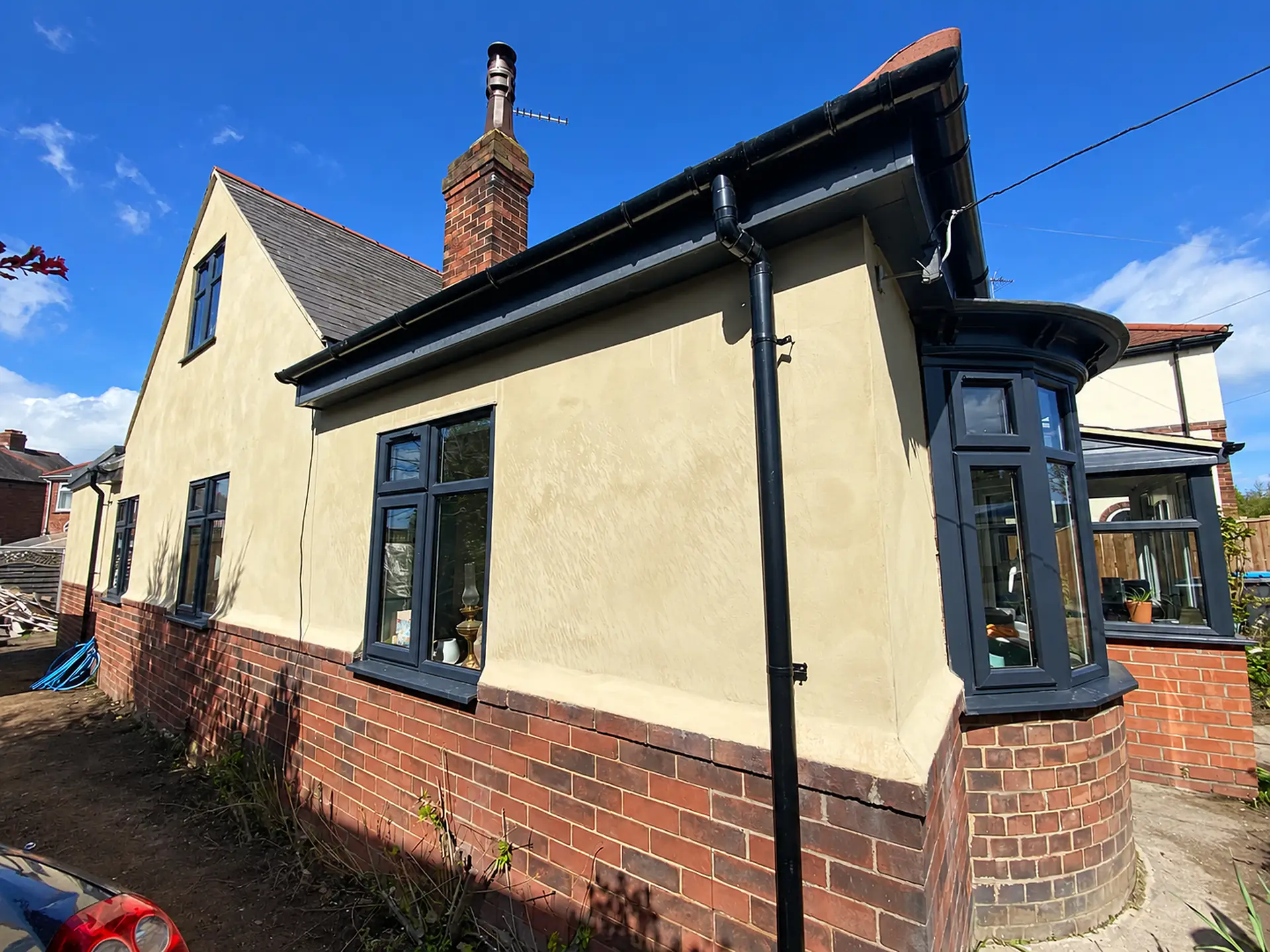 Rendered house with new bay windows