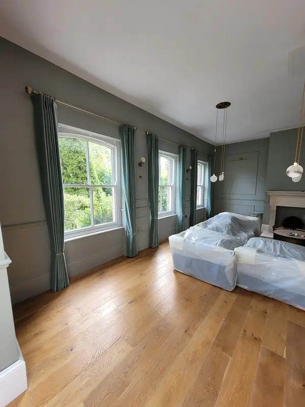Renovated sitting room with an oak floor