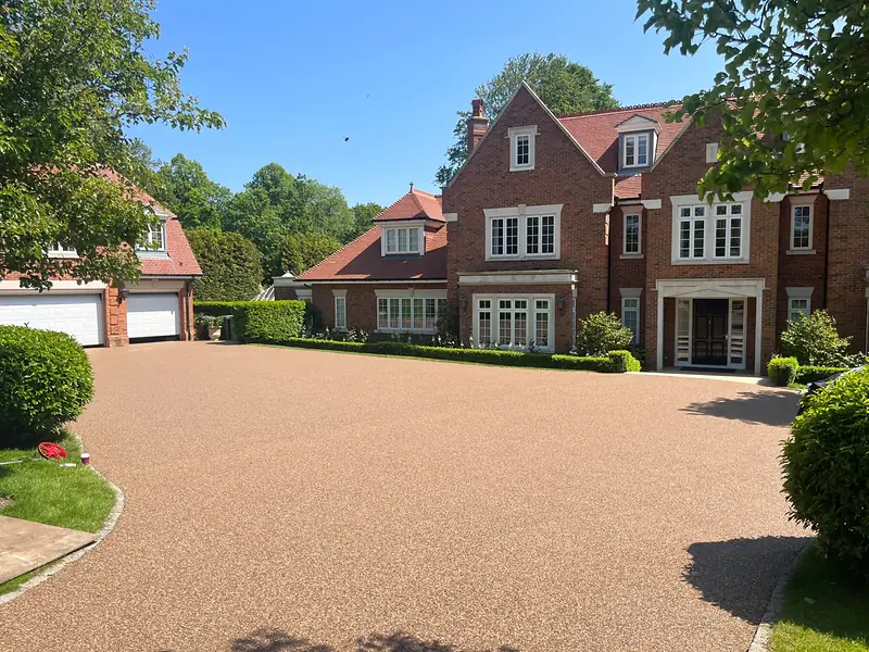 Resin bound driveway at a red brick house