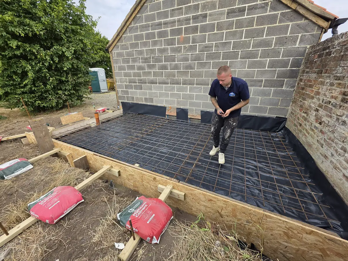 Setting out reinforcement mesh for a floor slab