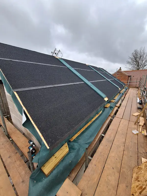 Slate roof with new rooflight openings