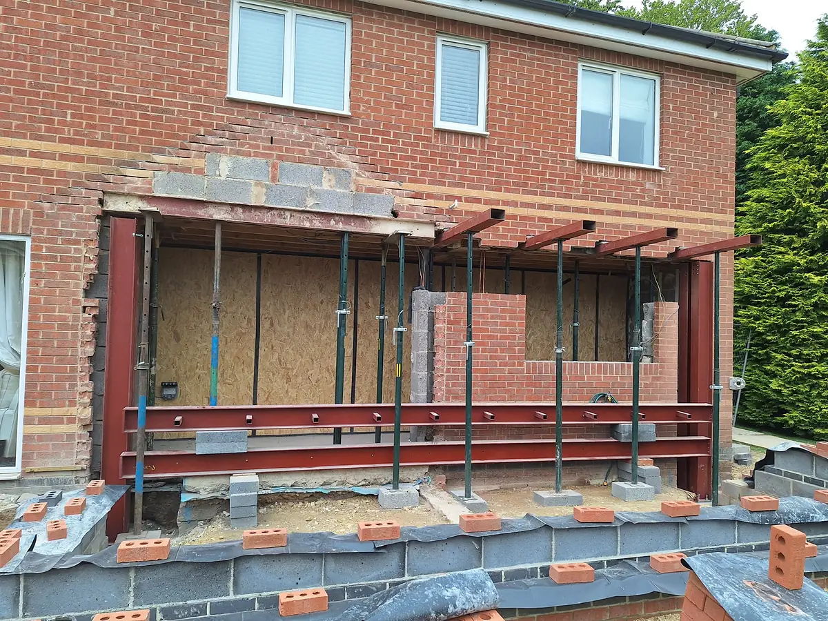 Steel frame and brickwork at the rear of the house