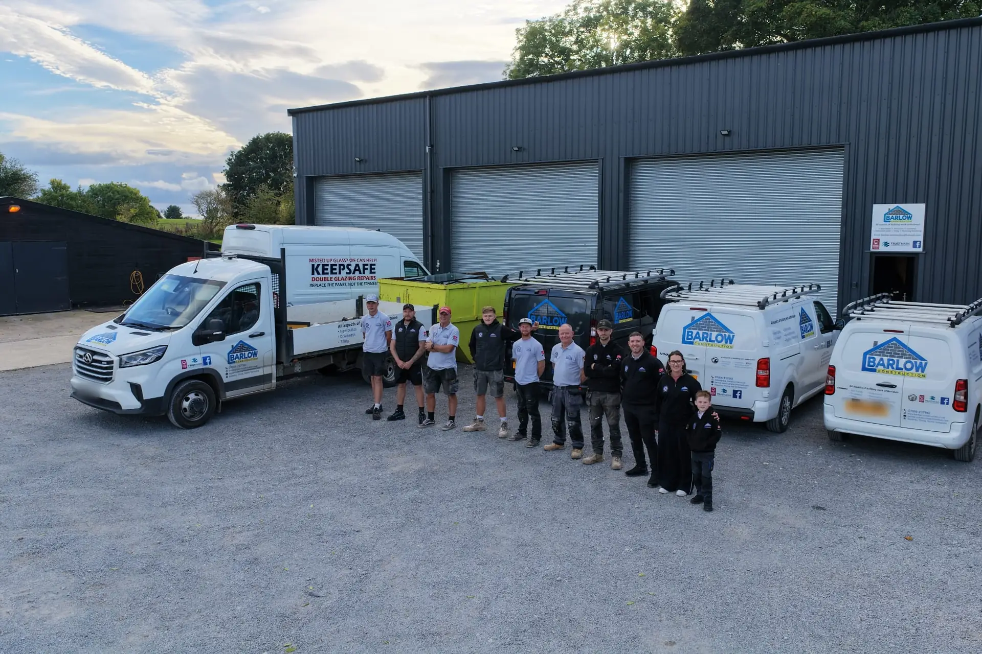 The Barlow Construction team with the vans outside our yard at Bridge Farm, Topcliffe