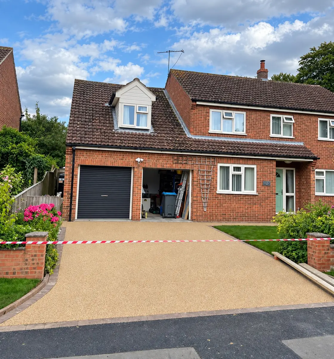 The same driveway relaid in buff resin with a block paved border, laid by our Daltex approved partner