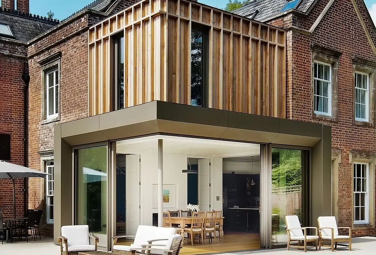 Timber clad extension with full height glazing