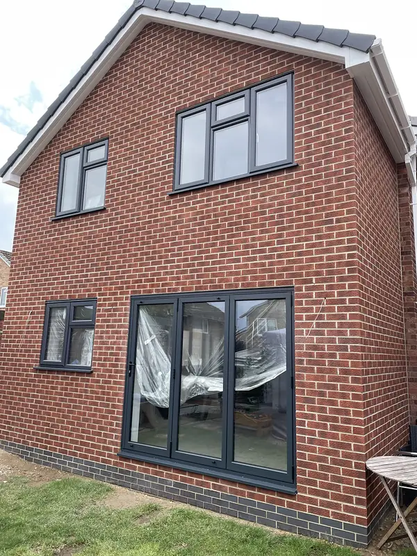 Two storey brick extension with bifold doors