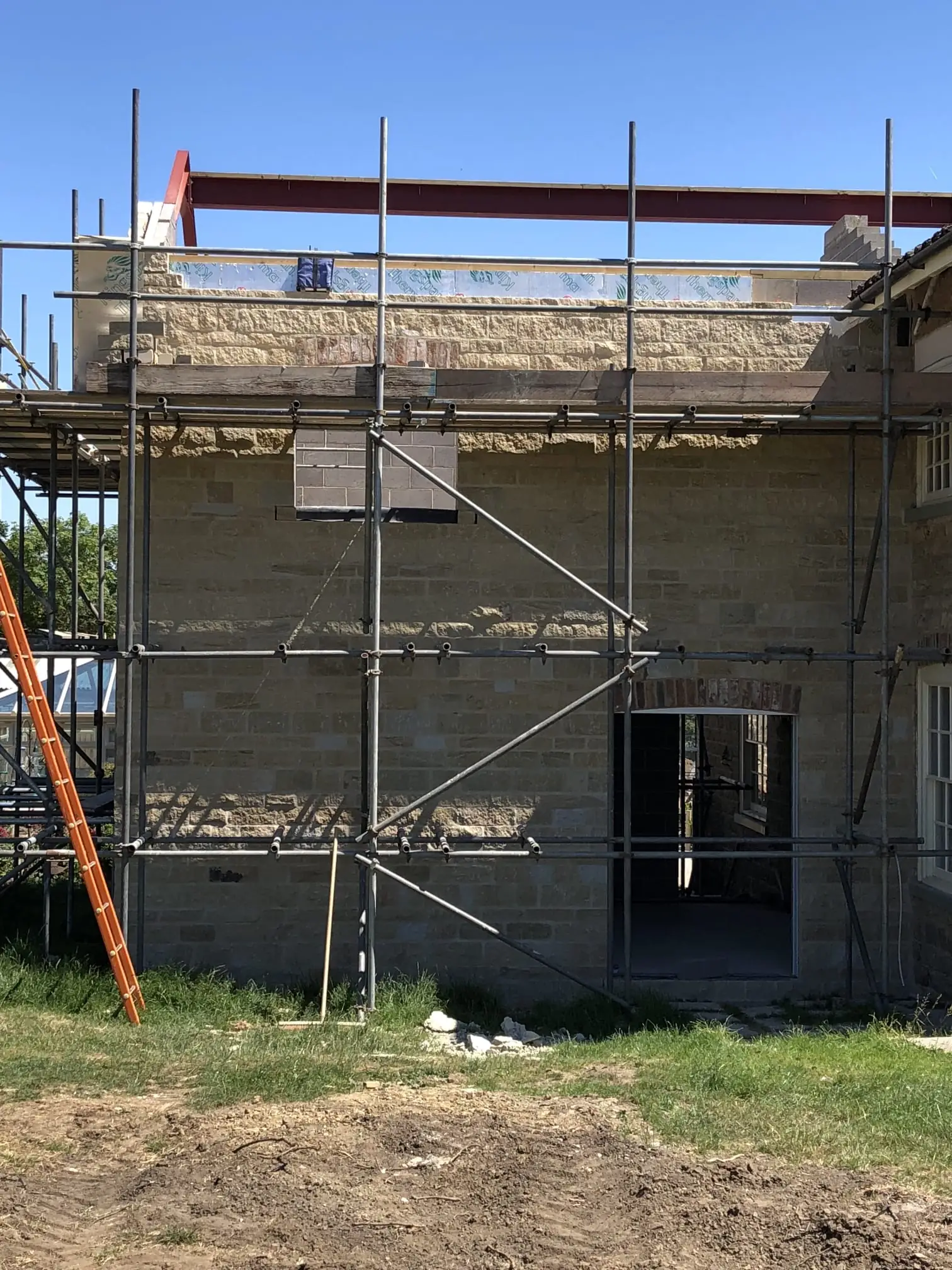 New build at the walls and scaffold stage